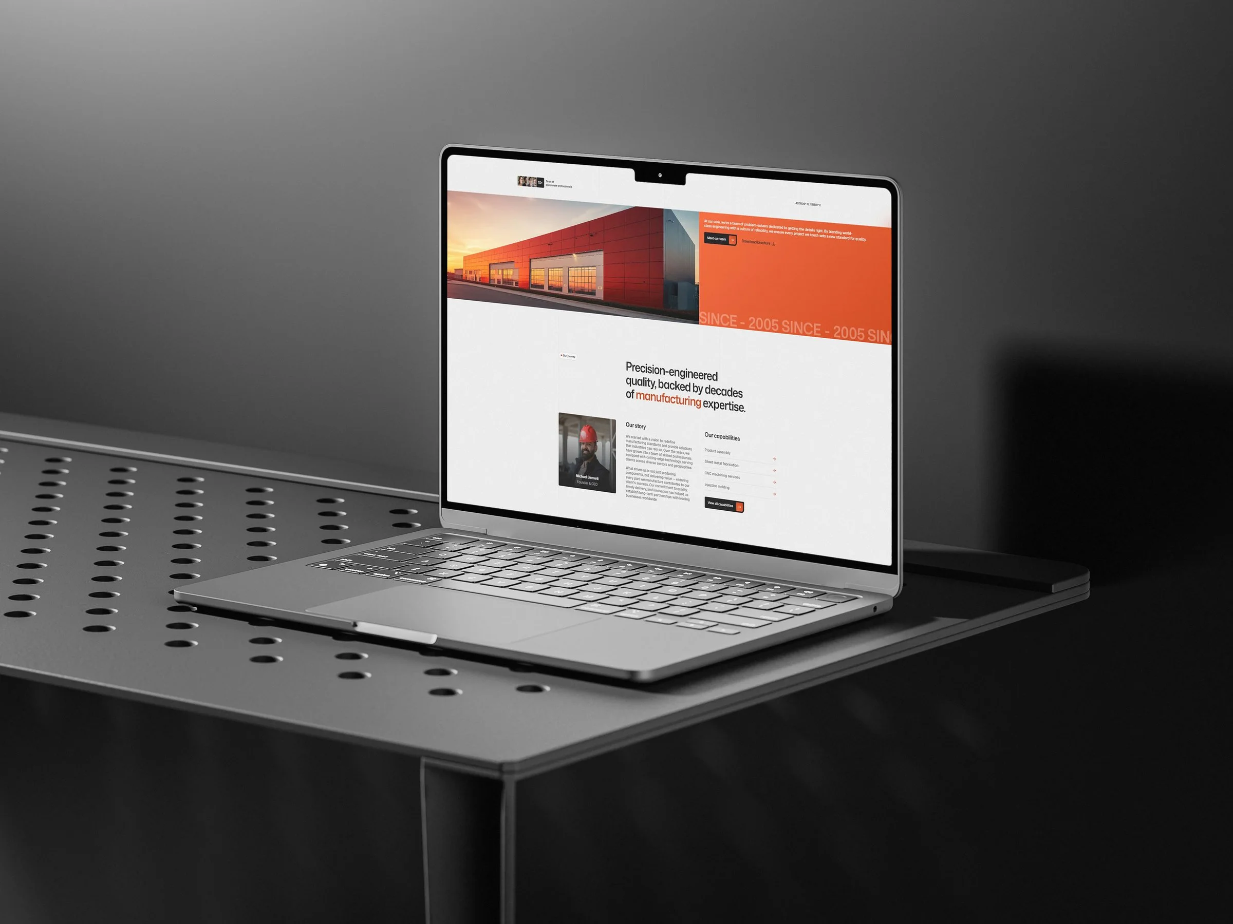 Velox Systems about page with a photo of a red factory building and an orange panel.